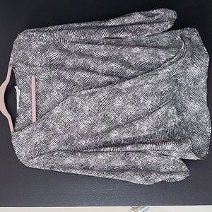 Black and white drapey blouse. Size small.